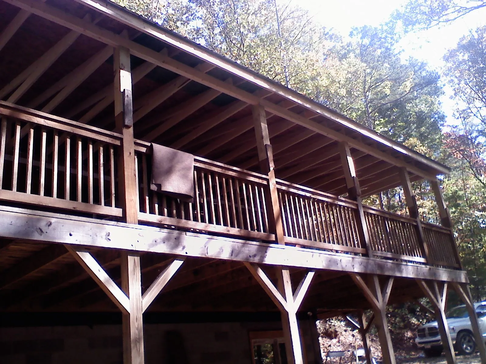 Timber framing under a new elevated porch and deck — Roof Leak Repair in Emory by Roofing Brothers